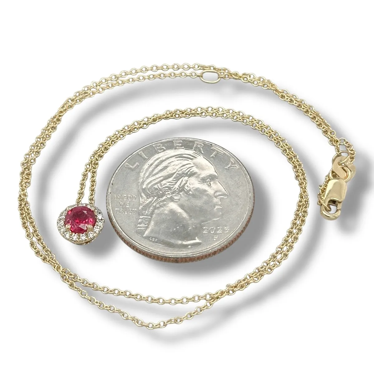 14K Y Gold 0.10ctw G/SI1 Diamond and 0.66ctw Ruby Halo Pendant