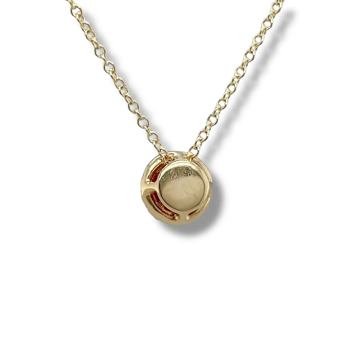 14K Y Gold 0.10ctw G/SI1 Diamond and 0.66ctw Ruby Halo Pendant