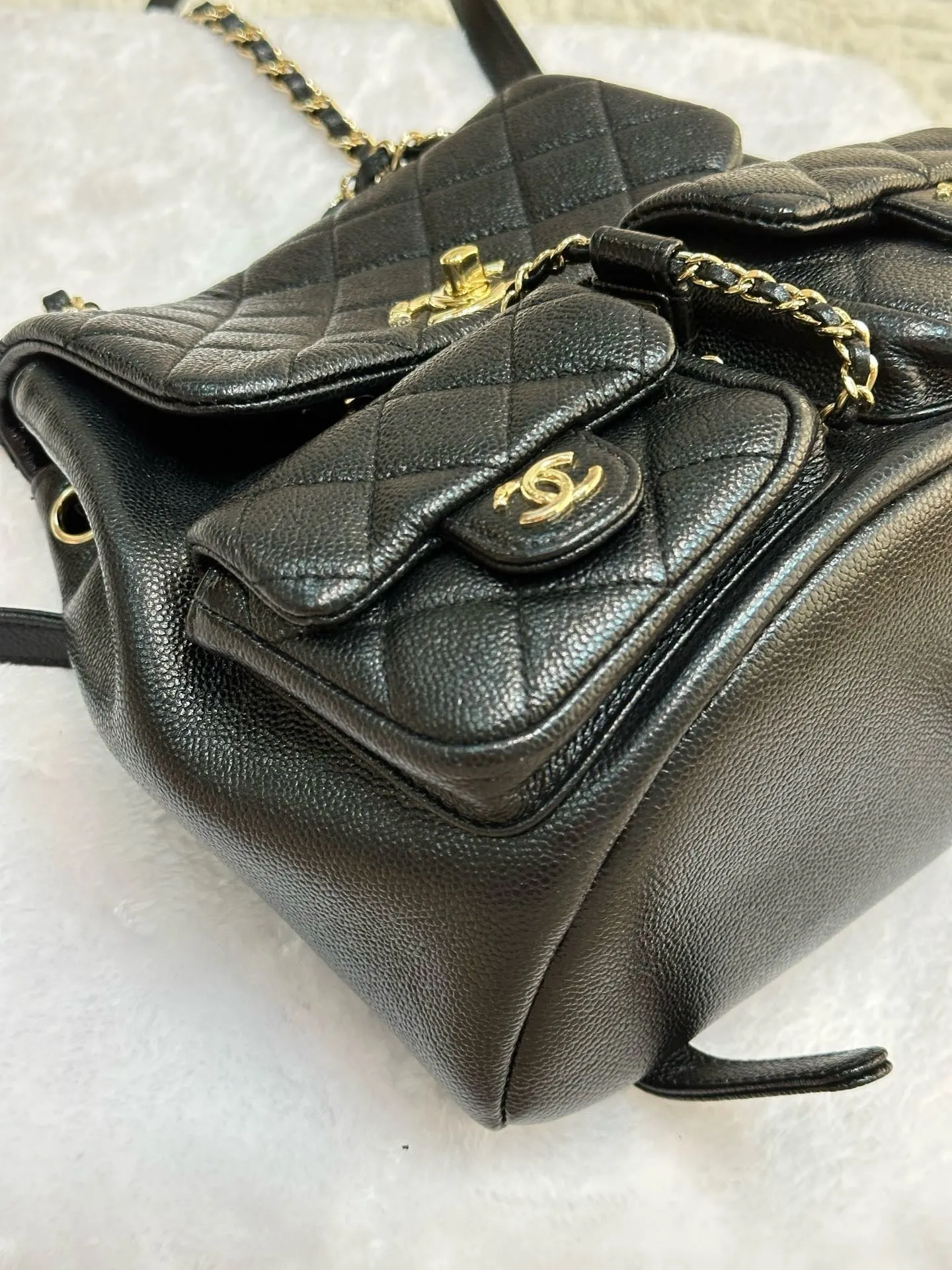 Chanel 23P Small Shiny Caviar Quilted Duma Pockets Drawstring Backpack Black GHW