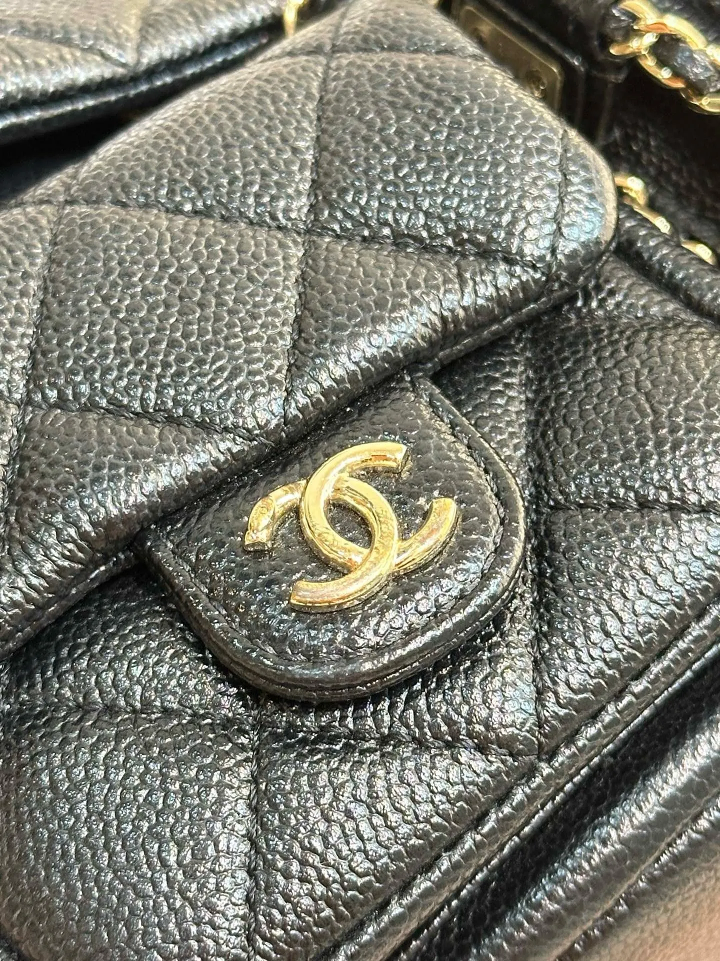 Chanel 23P Small Shiny Caviar Quilted Duma Pockets Drawstring Backpack Black GHW