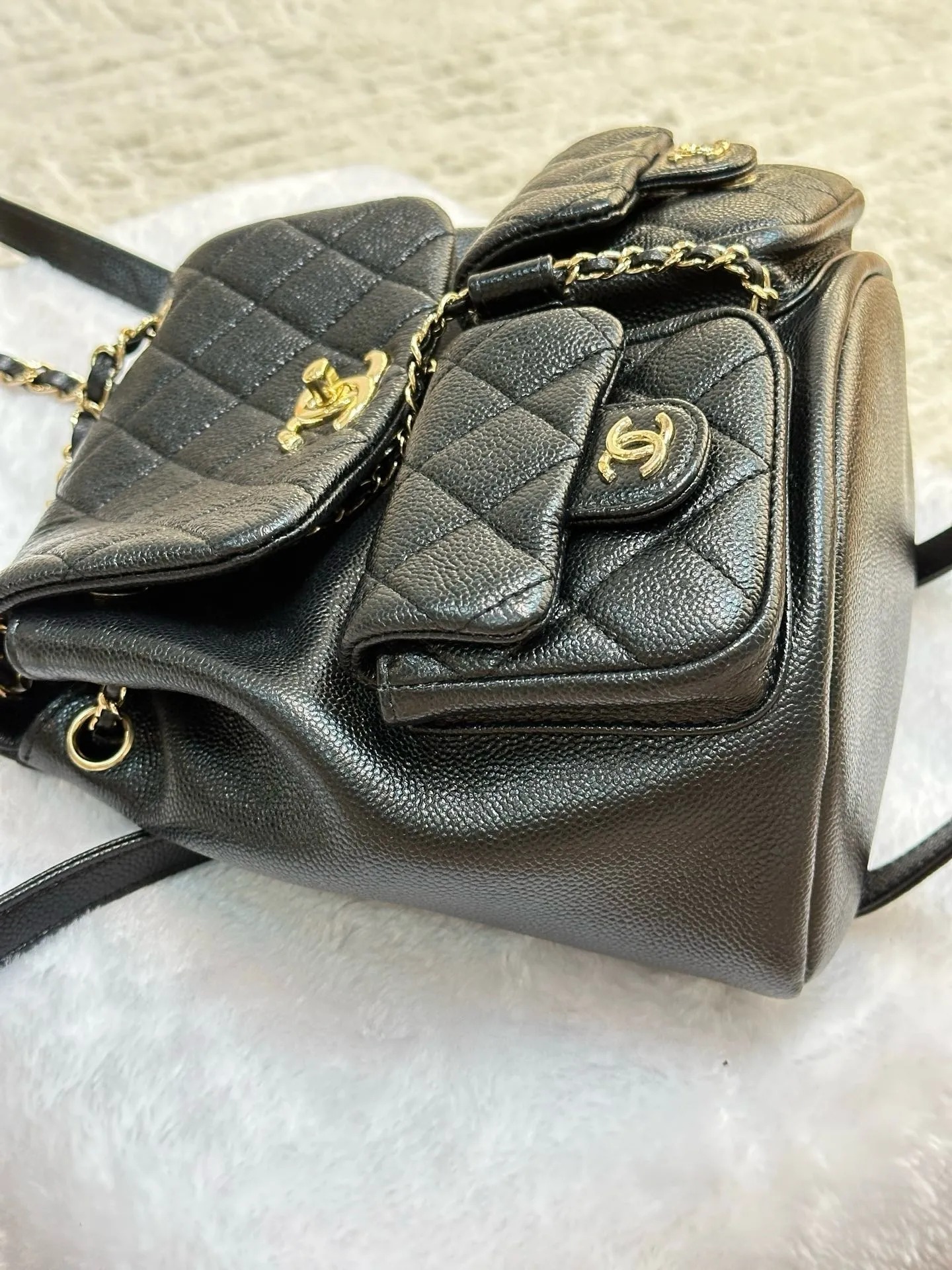 Chanel 23P Small Shiny Caviar Quilted Duma Pockets Drawstring Backpack Black GHW