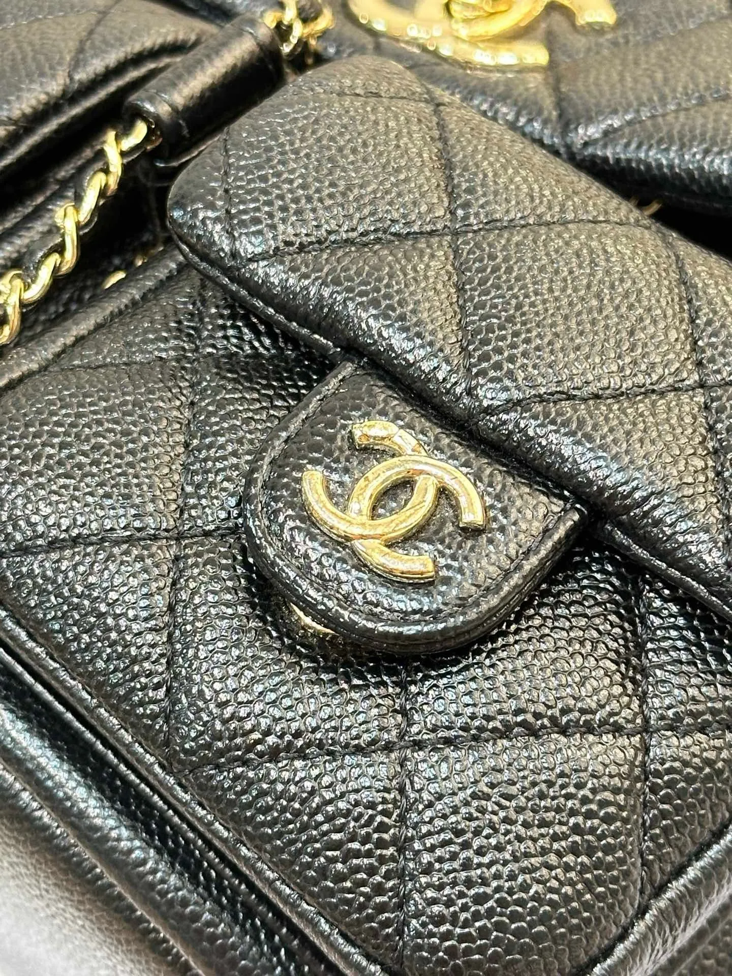 Chanel 23P Small Shiny Caviar Quilted Duma Pockets Drawstring Backpack Black GHW