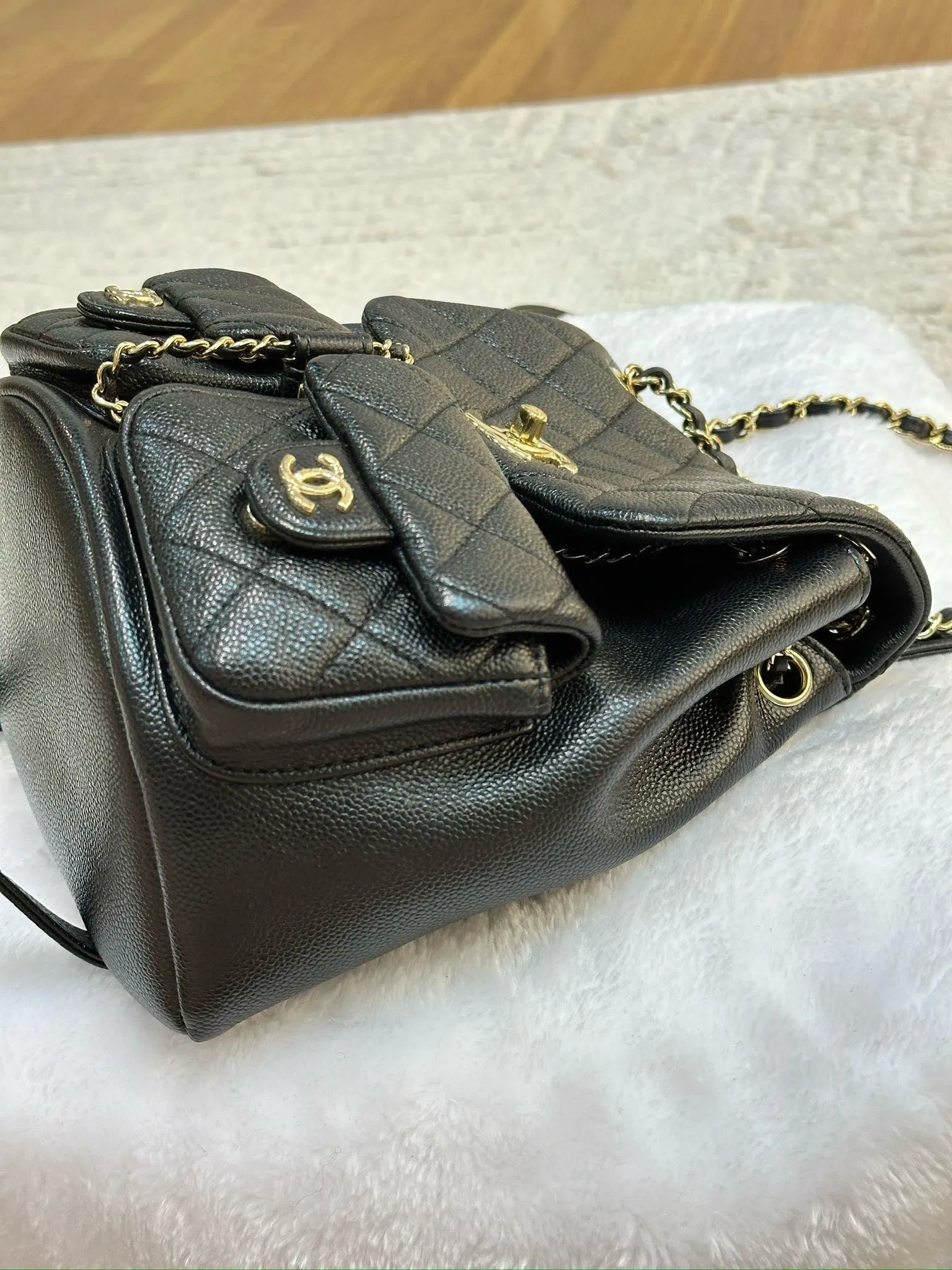 Chanel 23P Small Shiny Caviar Quilted Duma Pockets Drawstring Backpack Black GHW